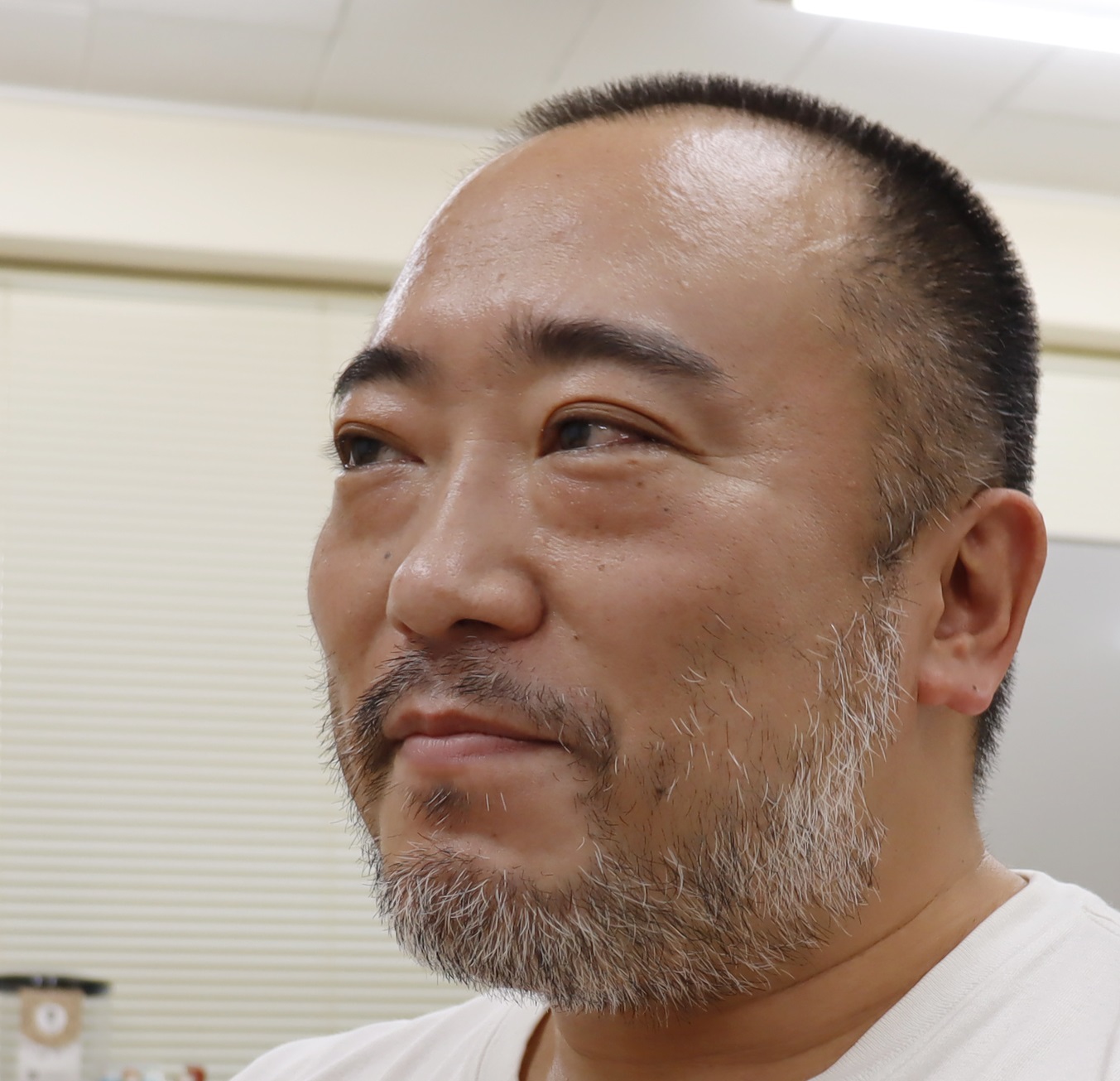小島 靖久さん